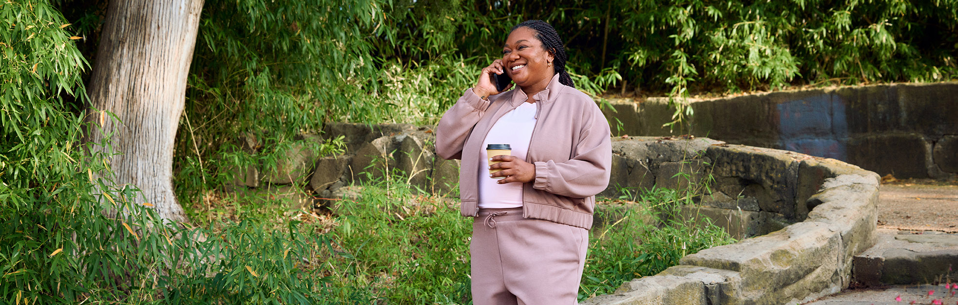 Woman walking in park.