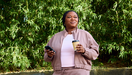 Woman walking in park.