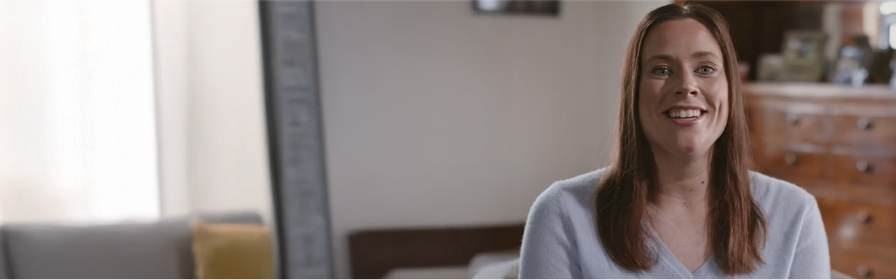 Woman smiling.