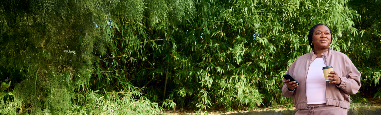 Woman walking in park.