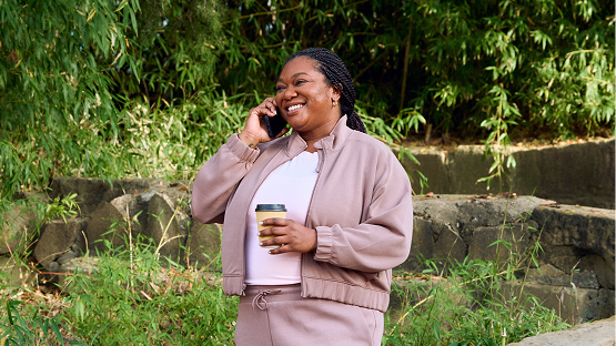 Woman walking in park.