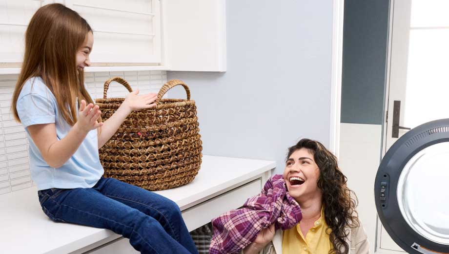 Mother and daughter laughing