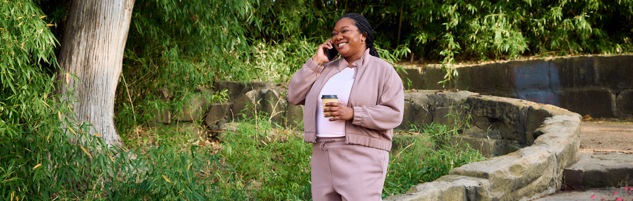 Woman walking in park.